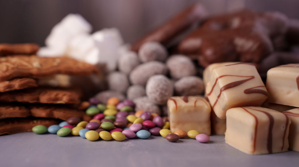 Avoid Hard or Chewy Foods After Rhinoplasty Assorted candies — hard or chewy foods increase jaw movement and can feel uncomfortable after rhinoplasty.